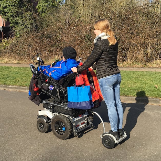 Running board trailer for electric vehicle or electric wheelchair